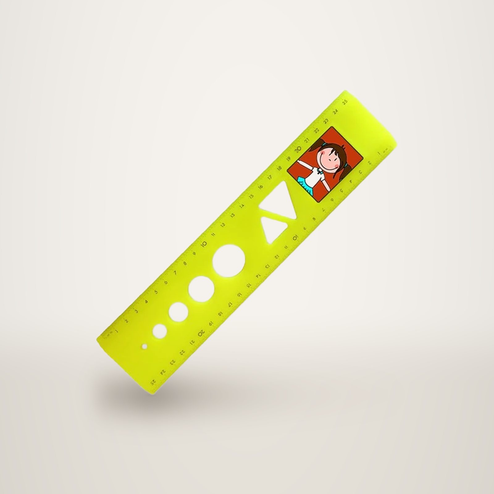 Une règle en plastique jaune fluo de 25 centimètres, ornée d'une illustration de petite fille et percée de cercles et de triangles.